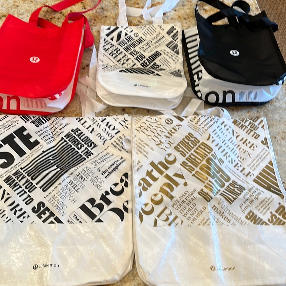 2 large and 3 small.  Never used only to bring items home